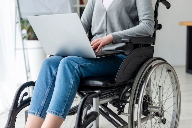 Portrait of woman working on a laptop