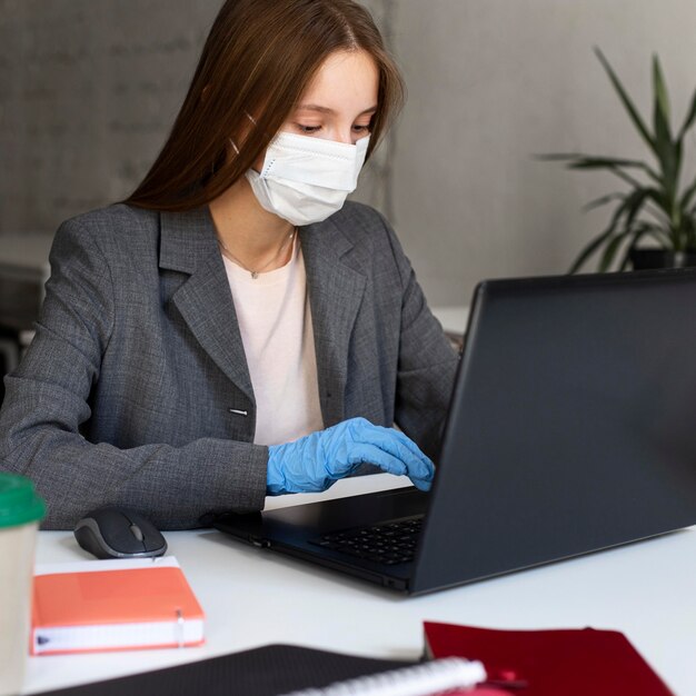 Portrait of woman working with face mask
