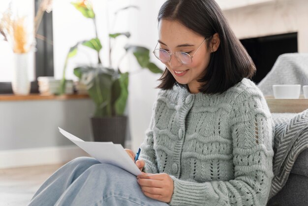 Portrait woman writing letter