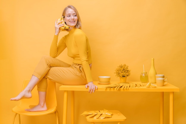 Portrait of  woman in a yellow scene