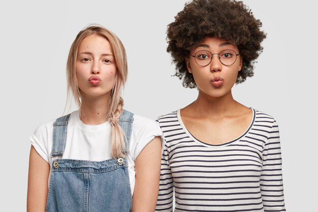 Portrait of women posing in casual clothes