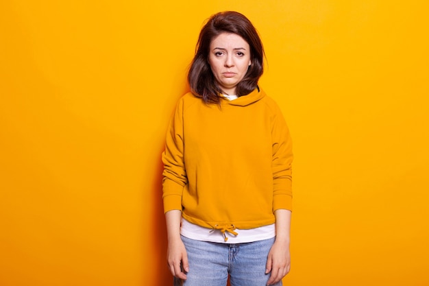 Free photo portrait of young adult feeling sad and disappointed