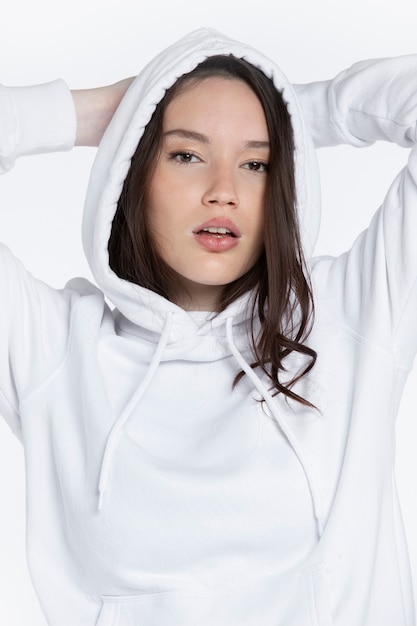 Portrait of young adult wearing hoodie mockup