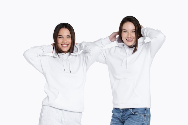 Portrait of young adults wearing hoodie mockup