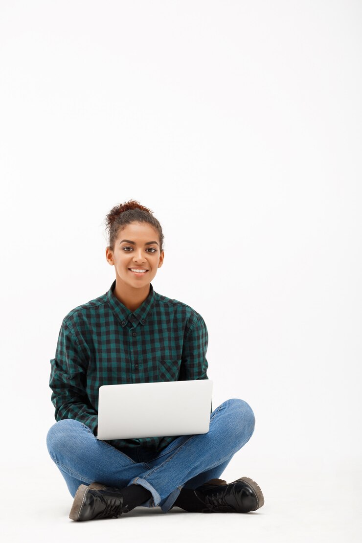 Free Photo portrait of young african woman with laptop on white