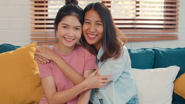 Portrait Young Asia Lesbian lgbtq women couple feeling happy smiling at home.