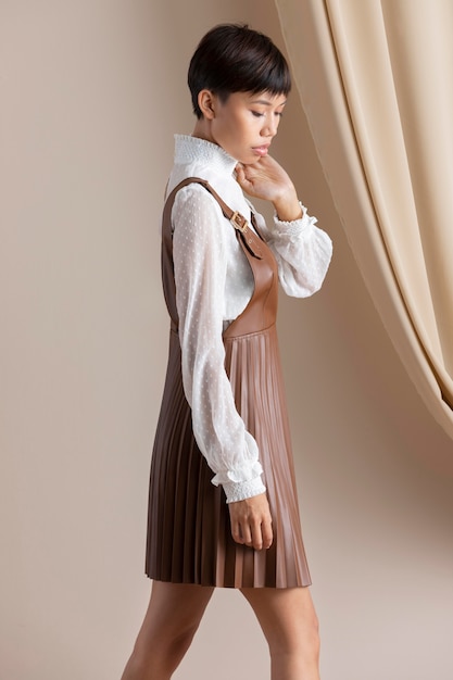 portrait of young asian woman in autumn clothes