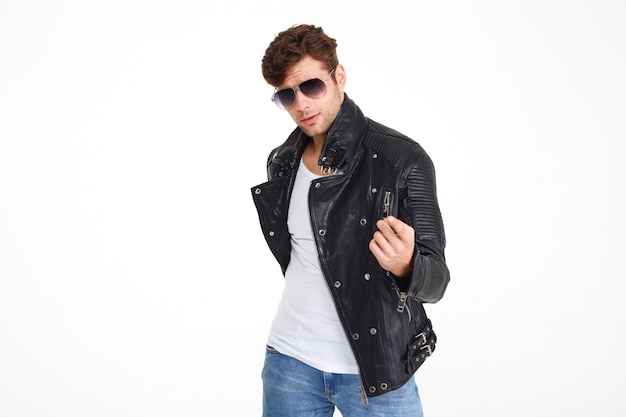 Portrait of a young attractive man in a leather jacket