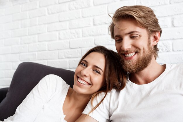 Portrait of young beautiful couple smiling 