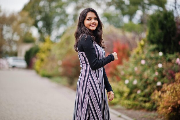 Portrait of young beautiful indian or south asian teenage girl in dress