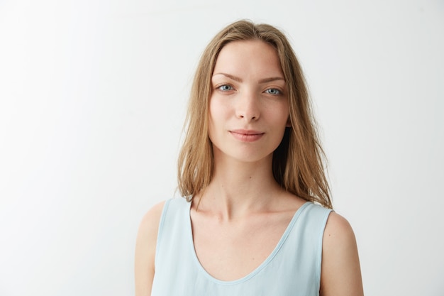 Portrait of young beautiful pretty girl smiling .