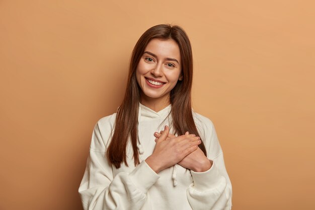 Portrait of young and beautiful woman gesticulating