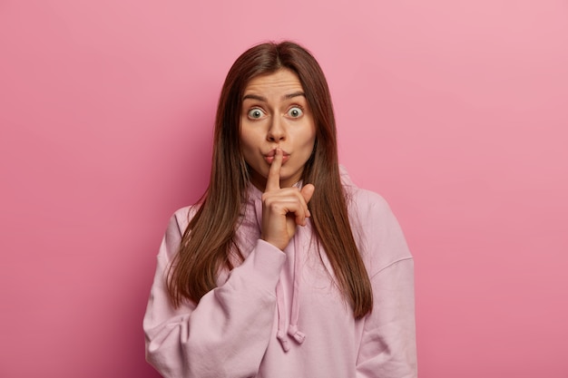 Portrait of young and beautiful woman gesticulating