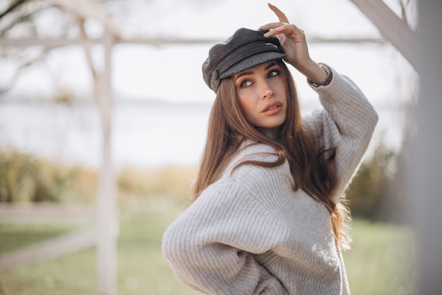 Portrait of a young beautiful woman in park