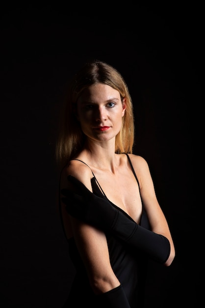 Portrait of young beautiful woman with black dress