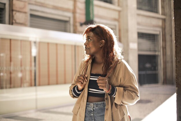 portrait of young black woman in the street