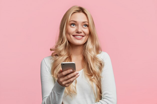 Portrait of young blonde woman posing