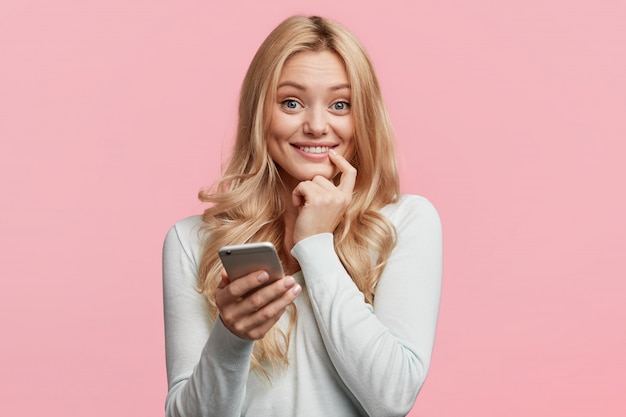 Portrait of young blonde woman posing