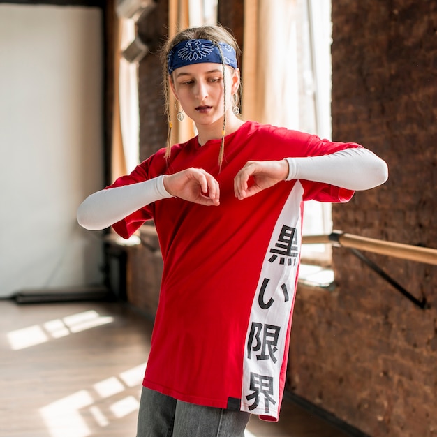 Portrait of a young blonde woman practicing in the dance studio