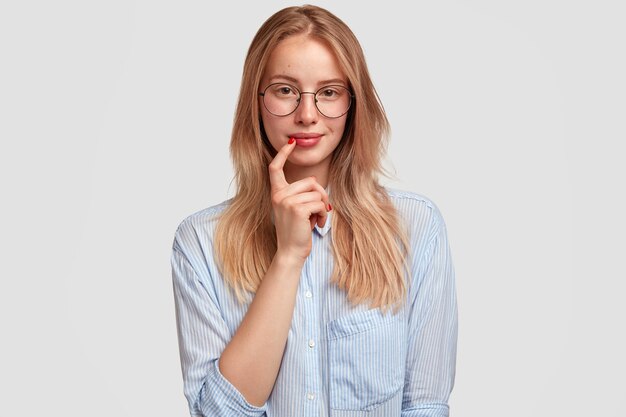 Portrait of young blonde woman