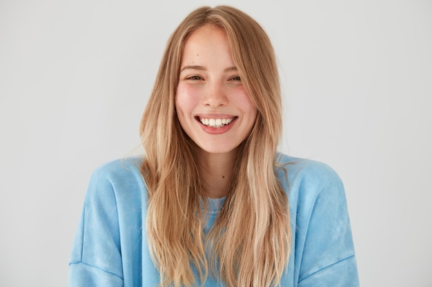 Portrait of young blonde woman