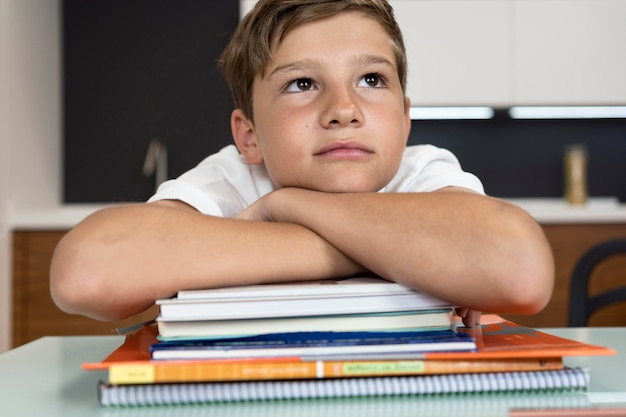 Portrait of young boy thinking