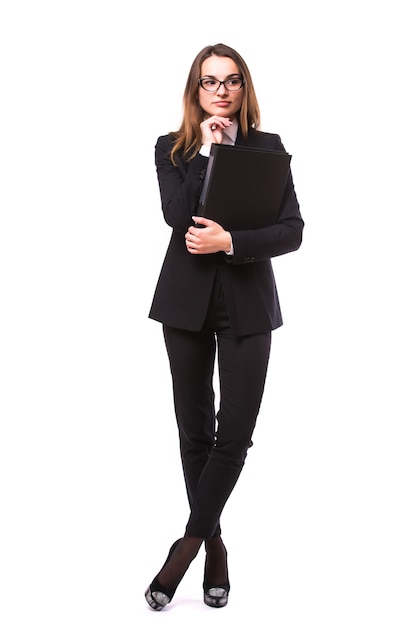 Portrait of young business woman with folder isolated on white wall