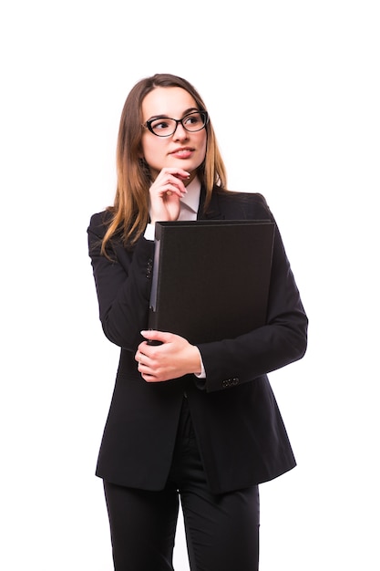 Portrait of young business woman with folder isolated on white wall