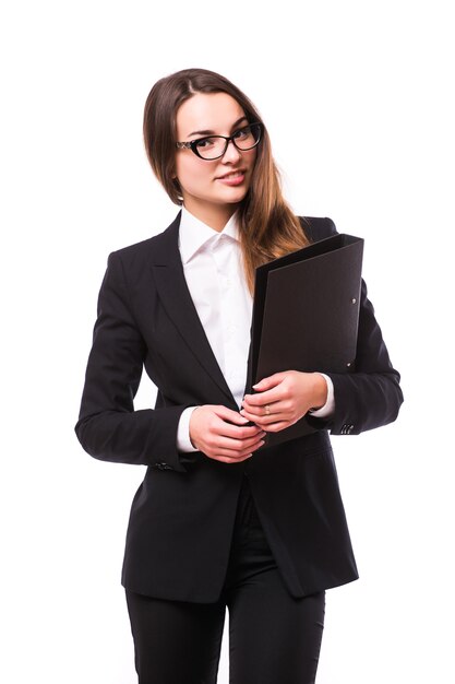 Portrait of young business woman with folder isolated on white wall