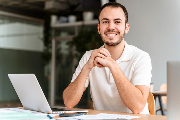 Portrait young businessman working