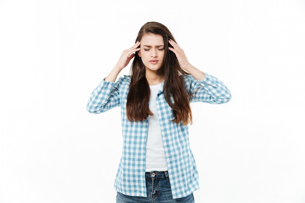 Free photo portrait of a young casual woman suffering from migraine