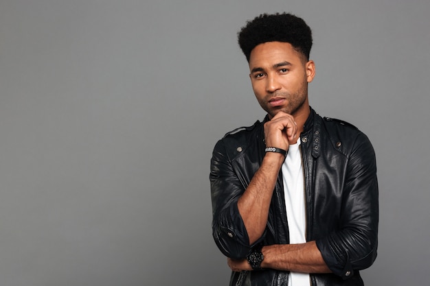 Free photo portrait of a young contemplative afro american man