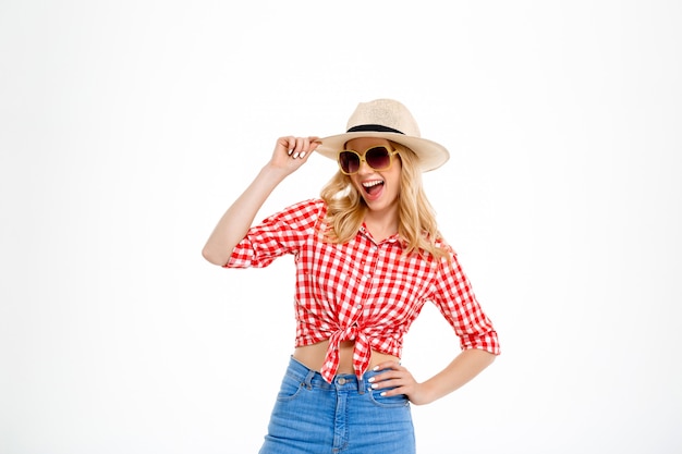 Portrait of young country woman  on white.