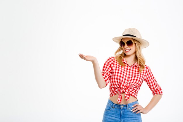 Portrait of young country woman  on white.