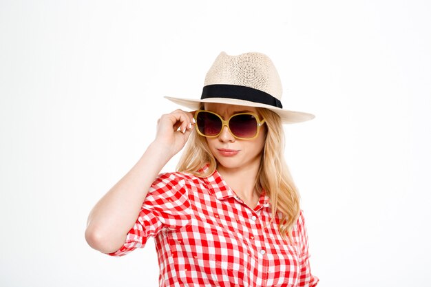 Portrait of young country woman  on white.