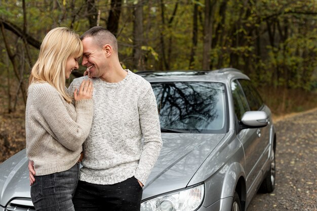 Portrait of young couple looking at each other in nature