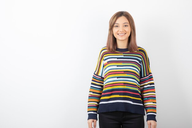 Portrait of a young cute woman model standing and posing.