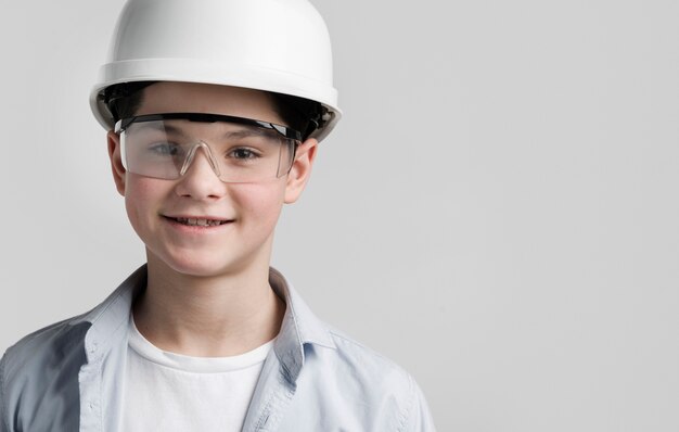 Portrait of young engineer with copy space