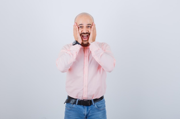 Free photo portrait of a young excited man