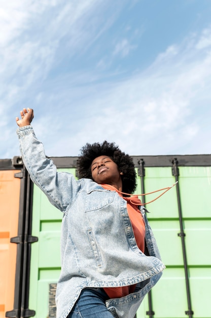 Free photo portrait young female jumping