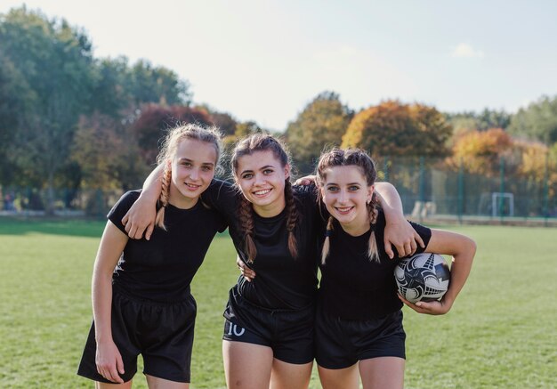 Portrait of young female rugby players