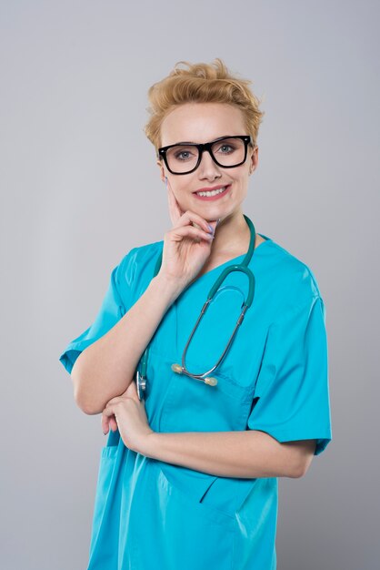 Portrait of a young female surgeon isolated