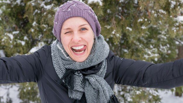 Portrait of a young funny woman teasing