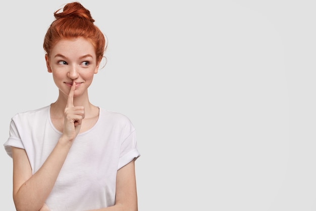 Portrait of young ginger woman