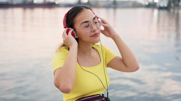 Portrait of young girl listening to music