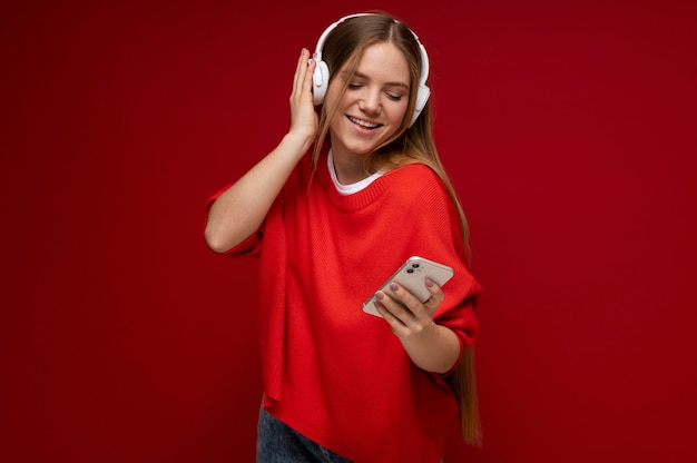 Portrait of a young girl listening to music