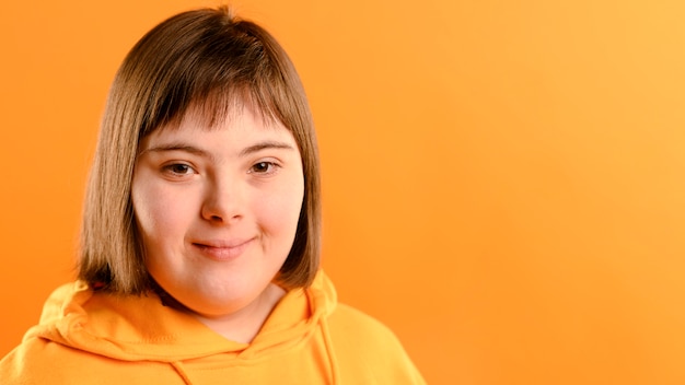 Portrait of young girl posing with copy space