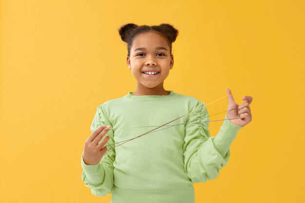 Portrait of young girl with elastic bands