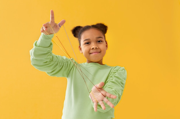 Portrait of young girl with elastic bands