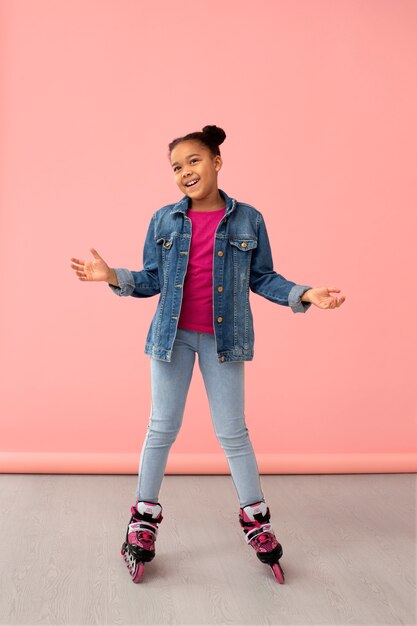 Portrait of young girl with roller blades